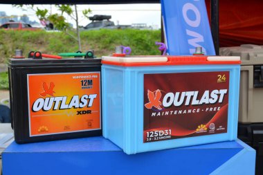 QUEZON CITY, PH - SEPT 28 - Outlast battery at 4x4 Expo on September 28, 2024 in Quezon City, Philippines. 4x4 Expo is a offroad vehicle show held in Philippines. clipart