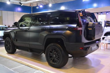 Pasay, PH-26 - Filipin Elektrikli Araç Zirvesi 'nde 26 Ekim 2024' te Pasay, Filipinler 'de bir Dongfeng kahramanı. Filipin Elektrikli Araç Zirvesi, Filipinler 'de her yıl düzenlenen bir otomobil etkinliğidir..