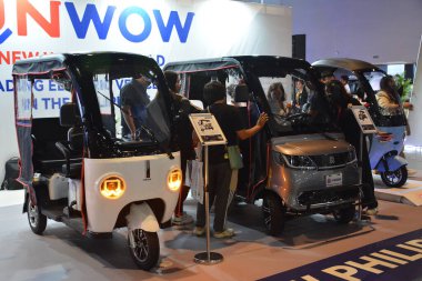 PASAY, PH - OCT 26 - Nwow booth at Philippine Electric Vehicle Summit on October 26, 2024 in Pasay, Philippines. Philippine Electric Vehicle Summit is a car event held annually in Philippines. clipart