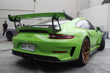 PARANAQUE, PH - JAN 11 - Porsche gt3 Rs Meyve suyu yılı açılışında 11 Ocak 2025, Paranaque, Filipinler. Meyve suyu yılı açılışı, Filipinler 'de düzenlenen bir otomobil yarışması.. 