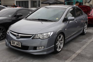 PARANAQUE, PH - JAN 11 - Honda Civic Meyve suyu yılı açılışında 11 Ocak 2025, Paranaque, Filipinler. Meyve suyu yılı açılışı, Filipinler 'de düzenlenen bir otomobil yarışması.. 