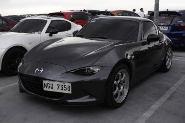 PARANAQUE, PH - JAN 11 - Mazda miata mx5 Meyve suyu yılı açılışında 11 Ocak 2025, Paranaque, Filipinler. Meyve suyu yılı açılışı, Filipinler 'de düzenlenen bir otomobil yarışması.. 