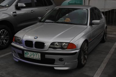 PARANAQUE, PH - JAN 11 - Bmw 316i at Juice year opener on January 11, 2025 in Paranaque, Philippines. Juice year opener is a car meet event held in Philippines.  clipart