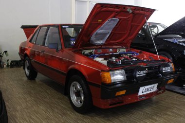 MUNTINLUPA, PH-JAN 28 - Mitsubishi Lancer 19 Ocak 2025 tarihinde Muntinlupa, Filipinler 'de Neo klasik araba fuarında. Neo Classic, Filipinler 'de düzenlenen bir pazar sonrası araba fuarıdır..