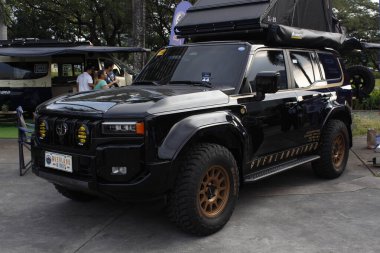 MUNTINLUPA, PH - JAN 28 - Toyota land cruiser at Neo classic car show on January 19, 2025 in Muntinlupa, Philippines. Neo classic is a aftermarket car show event in Philippines. clipart