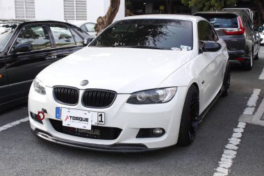 MUNTINLUPA, PH - JAN 28 - Bmw e92 19 Ocak 2025 tarihinde Muntinlupa, Filipinler 'de Neo klasik araba fuarında. Neo Classic, Filipinler 'de düzenlenen bir pazar sonrası araba fuarıdır..