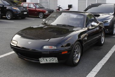 MUNTINLUPA, PH - JAN 28 - Mazda miata mx5 19 Ocak 2025 tarihinde Muntinlupa, Filipinler 'de Neo klasik araba fuarında. Neo Classic, Filipinler 'de düzenlenen bir pazar sonrası araba fuarıdır..