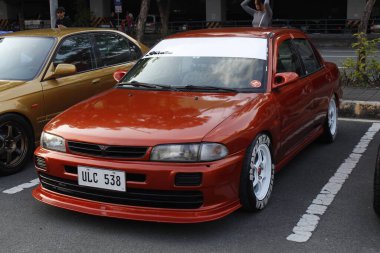 MUNTINLUPA, PH-JAN 28 - Mitsubishi Lancer 19 Ocak 2025 tarihinde Muntinlupa, Filipinler 'de Neo klasik araba fuarında. Neo Classic, Filipinler 'de düzenlenen bir pazar sonrası araba fuarıdır..