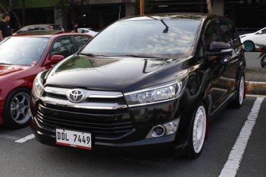 MUNTINLUPA, PH - JAN 28 - Toyota innova at Neo classic car show on January 19, 2025 in Muntinlupa, Philippines. Neo classic is a aftermarket car show event in Philippines. clipart