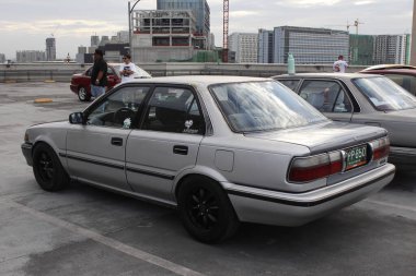 PARANAQUE, PH - 22 Şubat - Toyota corolla 22 Şubat 2025 tarihinde Paranaque, Filipinler 'de buluşacak. Fıstıklar Filipinler 'de bir kız araba grubu..