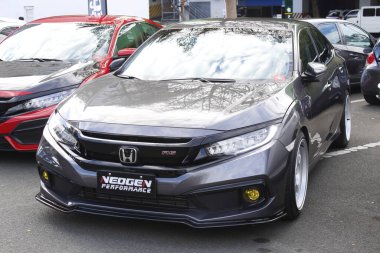 MUNTINLUPA, PH - MAR 8 - Honda Meet Manila 'da Honda civic 8 Mart 2025 tarihinde Muntinlupa, Filipinler' de. Honda Meet Manila, Filipinler 'de düzenlenen bir otomobil etkinliği.