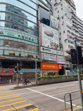 KOWLOON, HK - 23 Mayıs - Mannings cephe 23 Mayıs 2024 Kowloon, Hong Kong. Kowloon, Hong Kong 'da bir şehirdir.. 