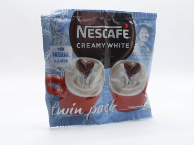 MANILA, PH - 22 Şubat - Nescafe kremalı beyaz ikiz paketi 22 Şubat 2025 tarihinde Manila, Filipinler 'de. Nescafe, Nestle tarafından satılan bir kahve markasıdır..