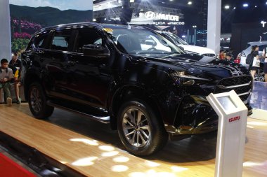 Pasay, PH - APR 13 - Isuzu mux Manila Uluslararası Otomobil Fuarı 'nda (MIAS) 13 Nisan 2025, Pasay, Filipinler. MIAS, Filipinler 'de düzenlenen bir otomobil fuarıdır..
