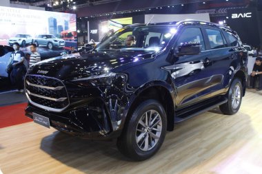 Pasay, PH - APR 13 - Isuzu mux Manila Uluslararası Otomobil Fuarı 'nda (MIAS) 13 Nisan 2025, Pasay, Filipinler. MIAS, Filipinler 'de düzenlenen bir otomobil fuarıdır..