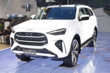 Pasay, PH - APR 13 - Isuzu mux Manila Uluslararası Otomobil Fuarı 'nda (MIAS) 13 Nisan 2025, Pasay, Filipinler. MIAS, Filipinler 'de düzenlenen bir otomobil fuarıdır..