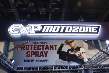 PASAY, PH - APR. 5 - Cxp Motozone işareti Makina Moto Show 'da 5 Nisan 2025 Pasay, Filipinler' de. Makina Moto, Filipinler 'de düzenlenen bir motosiklet fuarı.. 