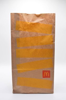 MANILA, PH - FEB 22 - Mcdonalds brown paper bag on February 22, 2025 in Manila, Philippines. Mcdonalds is a fast food restaurant in USA.
