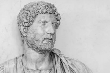 Black and white portrait of roman emperor sculpted in marble