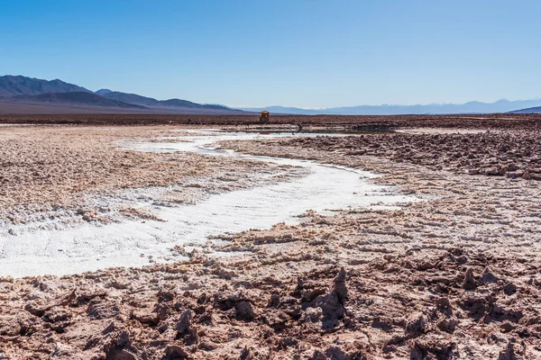 Dirt road to hidden lagoon of Baltinache in Atacama desert