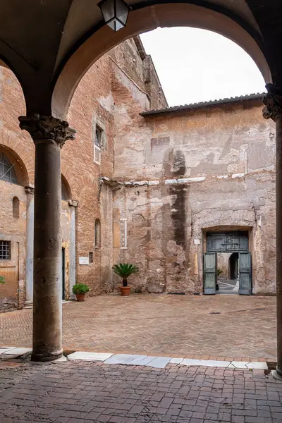 View of internal patio of medieval building in Italy