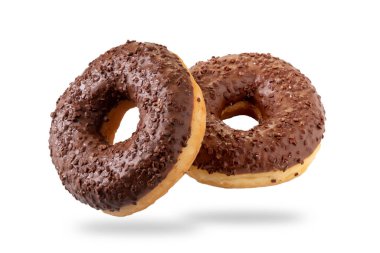 Donuts or doughnuts  with icing and chocolate praline isolated on white clipping path included