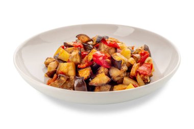 Italian vegetable caponata in white dish isolated on white with clipping path included