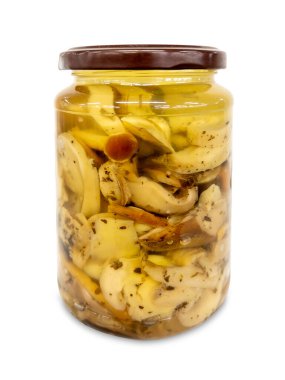 Mantar karışımı ile boletus edulis cam kavanozda yağlı, beyaza izole edilmiş, kırpma yolu ile birlikte.