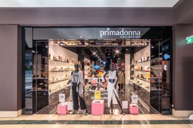 Turin, Italy - May 10, 2024: Primadonna Collection shoes and clothing Store in the Lingotto Torino shopping center, in the renovated former Fiat car factory.  clipart
