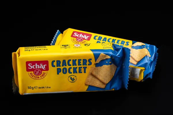 stock image Italy - September 01, 2024: gluten free crakers in single-serving packaging from Schar brand, which is a Italian South Tyrolean company specializing in gluten free foods