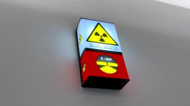 Uyarı, röntgen cihazlarının olduğu odada radyasyon tehlikesi belirtileri gösteriyor. Tex: Radiazioni, vietato ingresso (radyasyon, giriş yok)