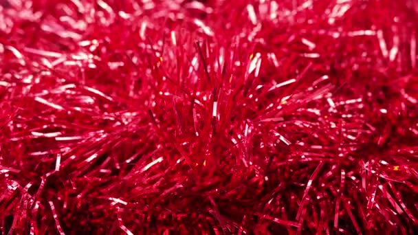 Red Brilliant Tinsel Flutters Wind Draft Christmas New Year Decoration — Vídeos de Stock