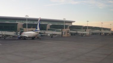 Ankara, Turkey, January 18, 2023. Shot from the window of an aircraft moving along the airfield. Terminals and buildings of Ankara Esenboga Havalimani Airport. International and domestic flights