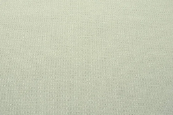 pale background fabric texture. A piece of woolen cloth is neatly laid out on the surface. Weave and textile texture. Dress fabric or for kitchen needs, tablecloth or curtains, close-up. Dash.