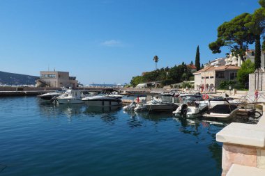 Meljine, Herceg Novi, Montenegro, August 13 2022 Boats, yachts and ships are at anchor. Moored ships in the parking lot. Adriatic Sea Mediterranean. Travel business. Sea travel and sports. Summertime