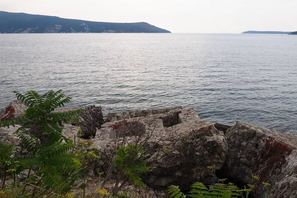 Stock image Fort Mezaluna Mesaluna Citadel Citadela Montenegro, Herceg Novi. The ruins of an ancient stone fortress, destroyed in an earthquake, fell into the Adriatic Sea, the Mediterranean. Tourist attractions