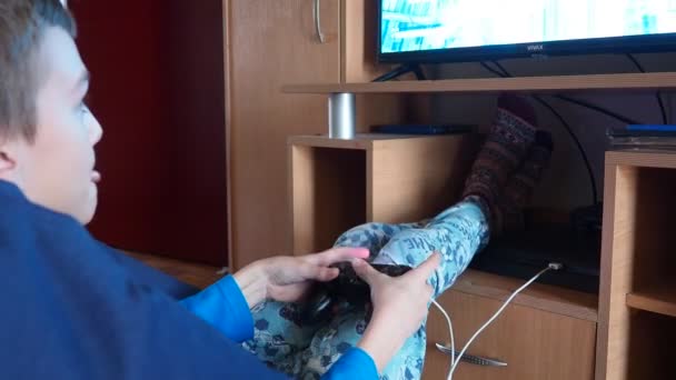 Sremska Mitrovica Serbia Boy Uses Joystick Play Video Game Playstation — Stock Video