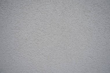 Alçı arka plan deseni. Alçı, duvarların ve tavanların koruyucu veya dekoratif kaplamalarında ve kalıp ve döküm elementlerinde kullanılan bir yapı malzemesidir. Bina cephesi.