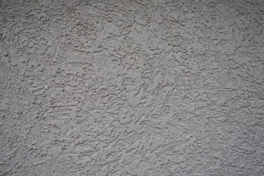 Alçı arka plan deseni. Alçı, duvarların ve tavanların koruyucu veya dekoratif kaplamalarında ve kalıp ve döküm elementlerinde kullanılan bir yapı malzemesidir. Bina cephesi.