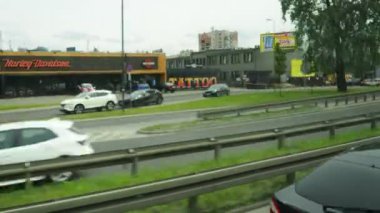 Warsaw, Poland, 4.9.24: the capital and largest city in Poland by population and territory. A trip through the city streets, shooting from the window. Architecture, cars and people. Public transport.