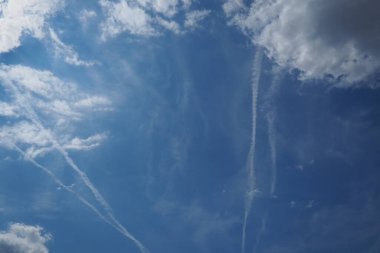 Chemtrail conspiracy theory. Long-lasting condensation trails left in sky by high-flying aircraft are actually chemtrails consisting of chemical or biological agents, sprayed for nefarious purposes. clipart