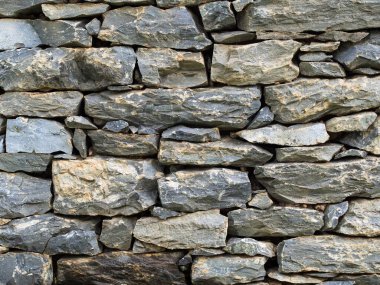 Eski taşlar duvar, dekoratif tasarım için arka plan dokusudur..