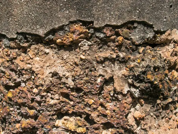 含砾石的旧混凝土墙 装饰设计的背景表面 — 图库照片