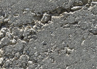 Beton duvar yüzeyi çatlamış ve dayanıklı, dekoratif tasarım için soyut desenli arkaplan deseni.