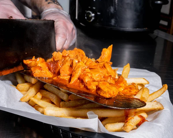 delicious, crunchy chicken fries with buffalo dressing on a platter