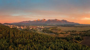 snowy peaks of the Tatras with the first snow in autumn, city Svit,beautiful Slovak unspoilt nature, a wonderful destination for vacation and relaxation