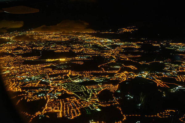 night Lisbon from above illuminated streets and monuments