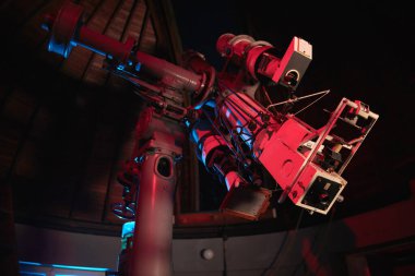 Big astronomical telescope in observatory for science research.