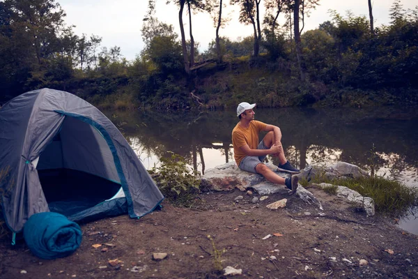 Man camping in nature.