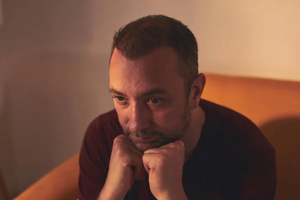 stock image Bored man with lethargy and apathy sitting at home alone.